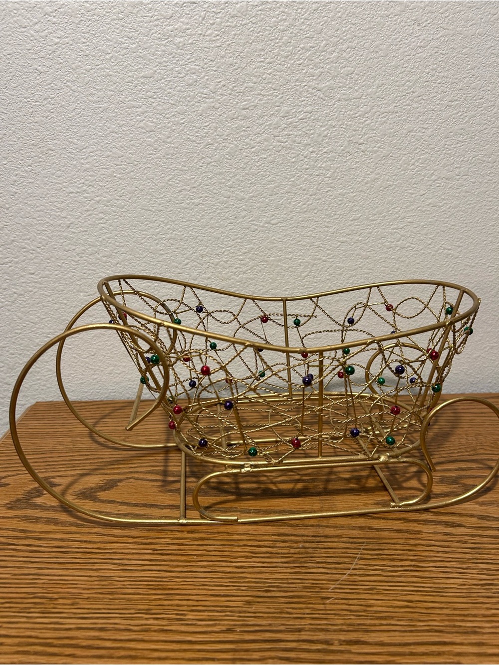 Gold Decorative Sleigh with Multicolor Bead Accents